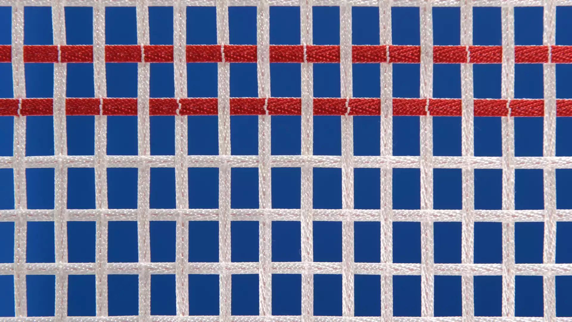 Lona de salto 4x4 mm + barras de anclaje cosidas